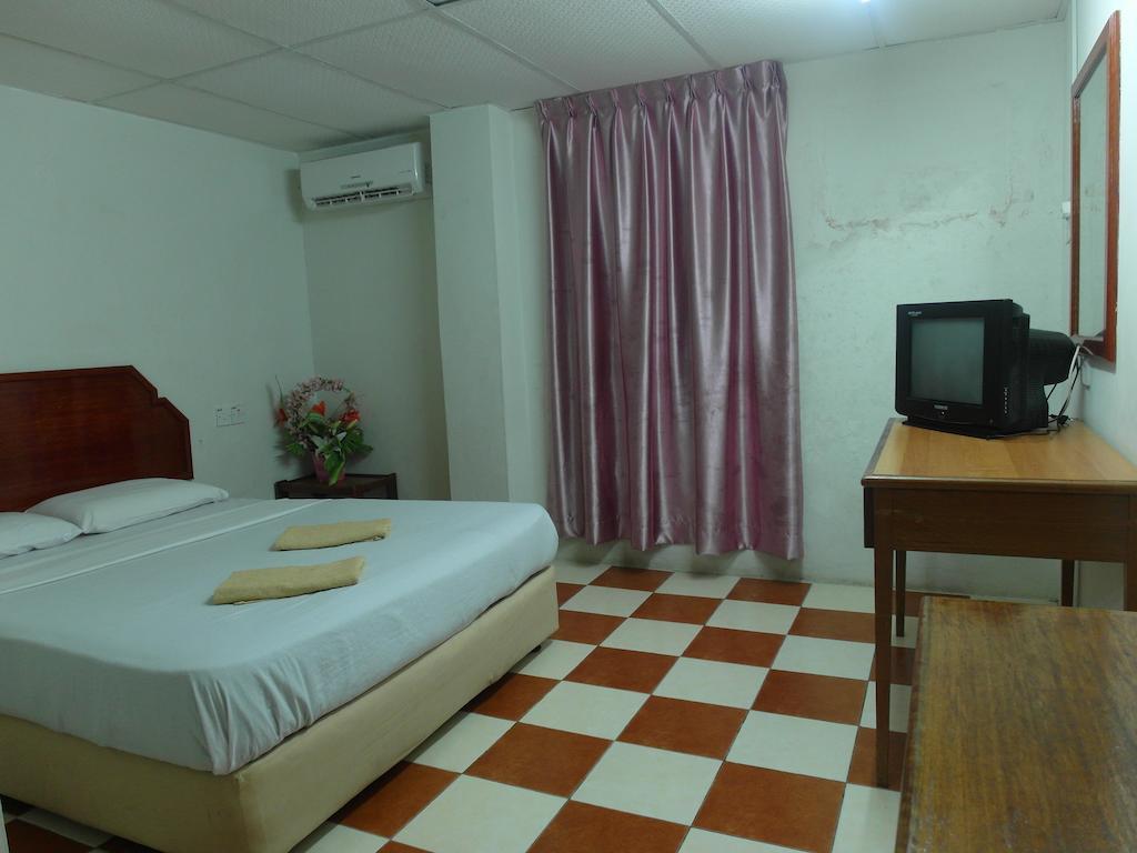 Silverwood Inn Miri Quarto foto